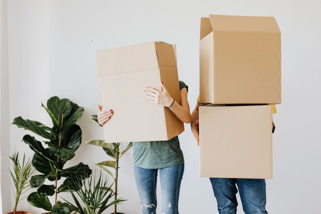 Tips for Moving to A Big City - Couple cardboard boxes