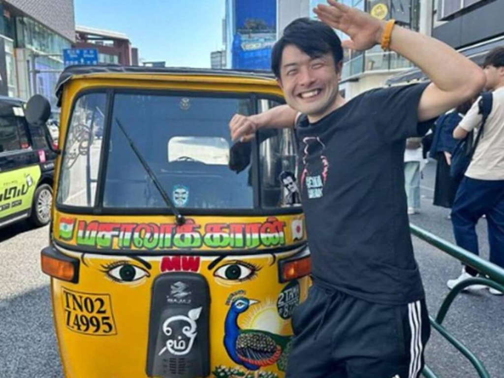 Tamil Cinema in Japan: A Rajinikanth superfan posing with an imported Tamil style auto rickshaw